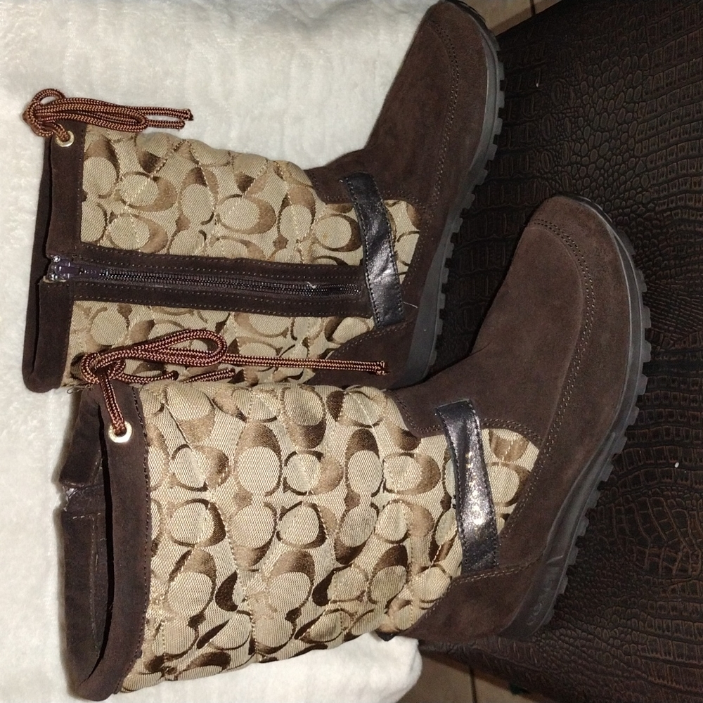 Brown/Tan (size 6) Coach boots missing the balls form the string in front (used)